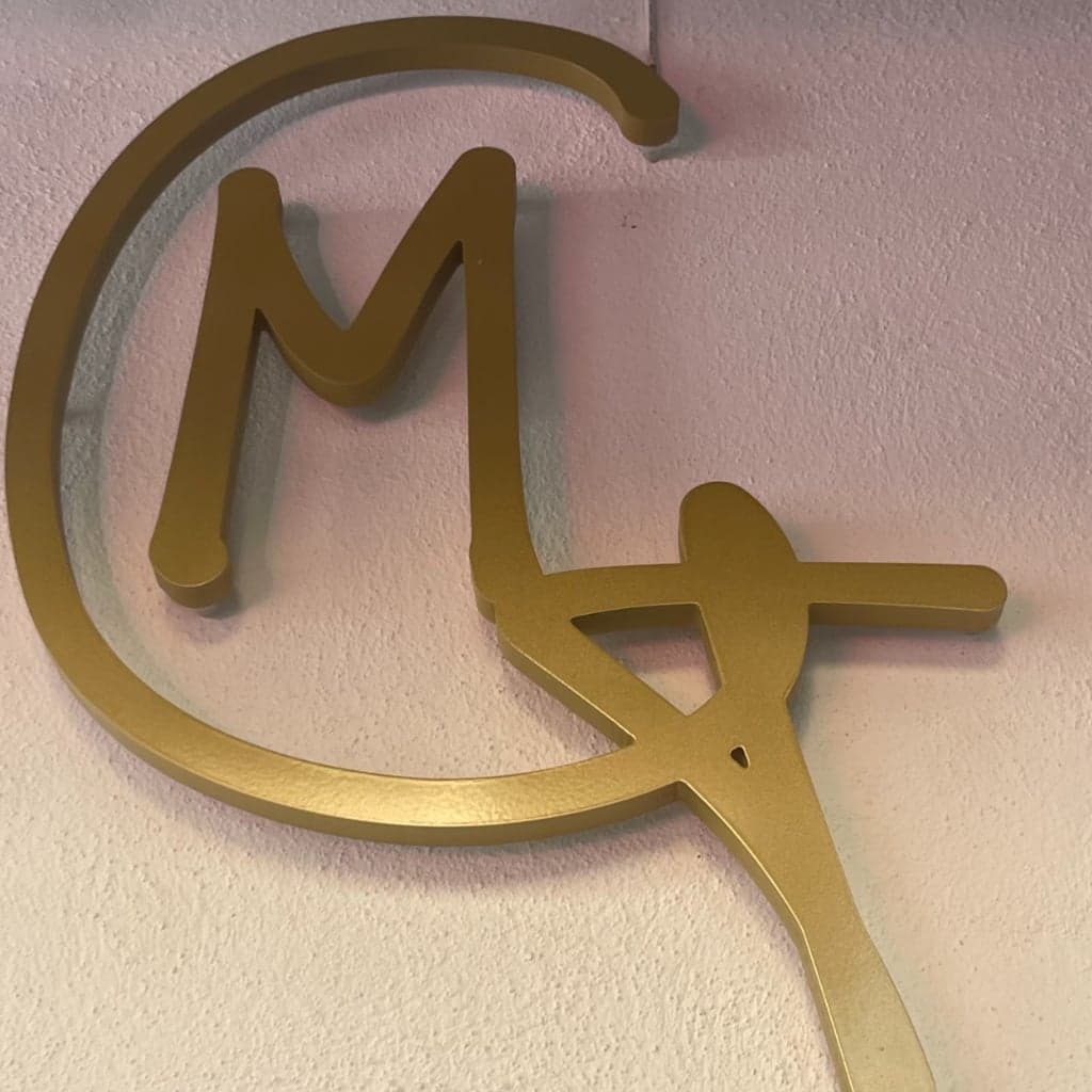 Manolo, Café y Tapas Logo
